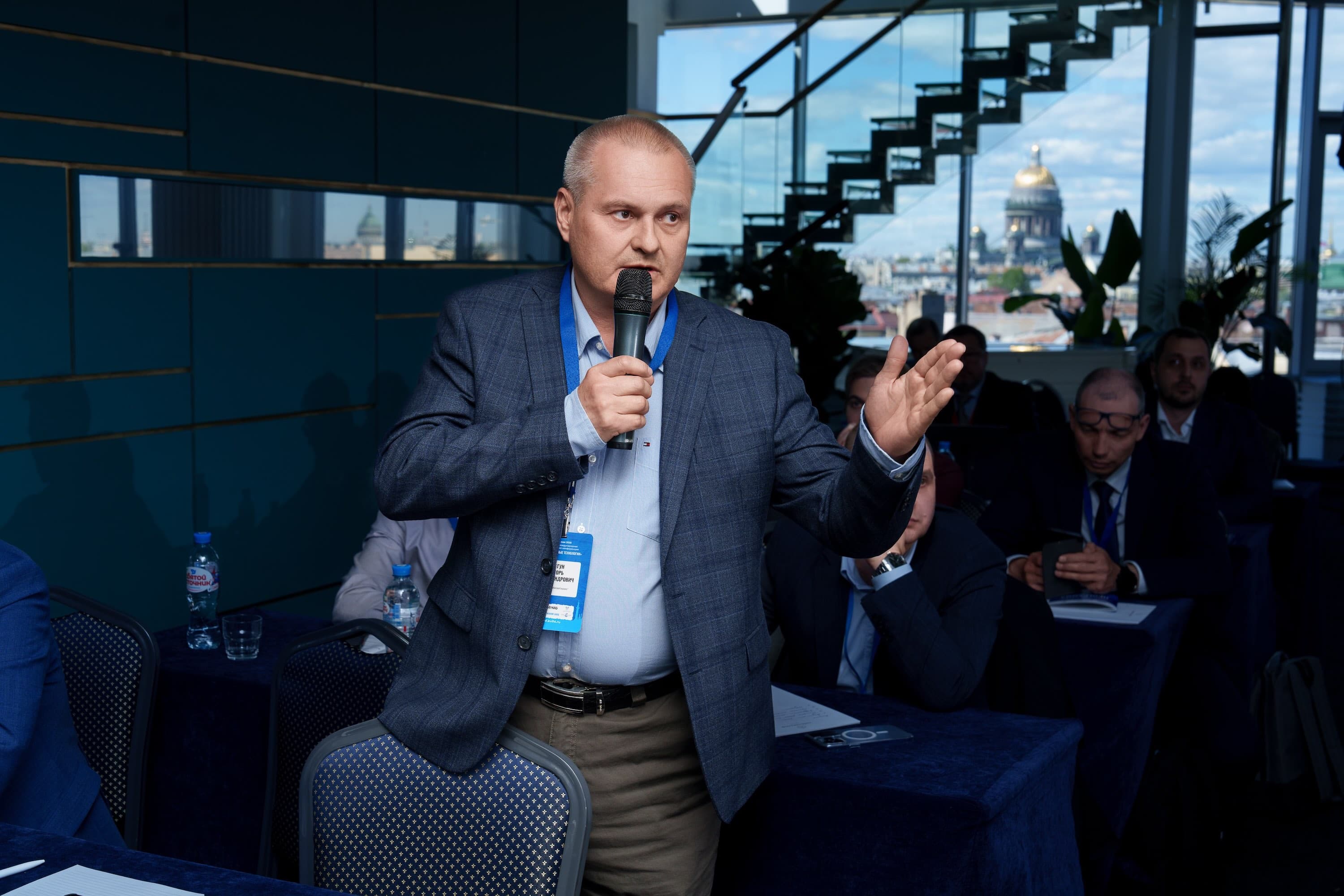 Igor Legun answers audience questions at the "Compressor Technologies 2025" conference